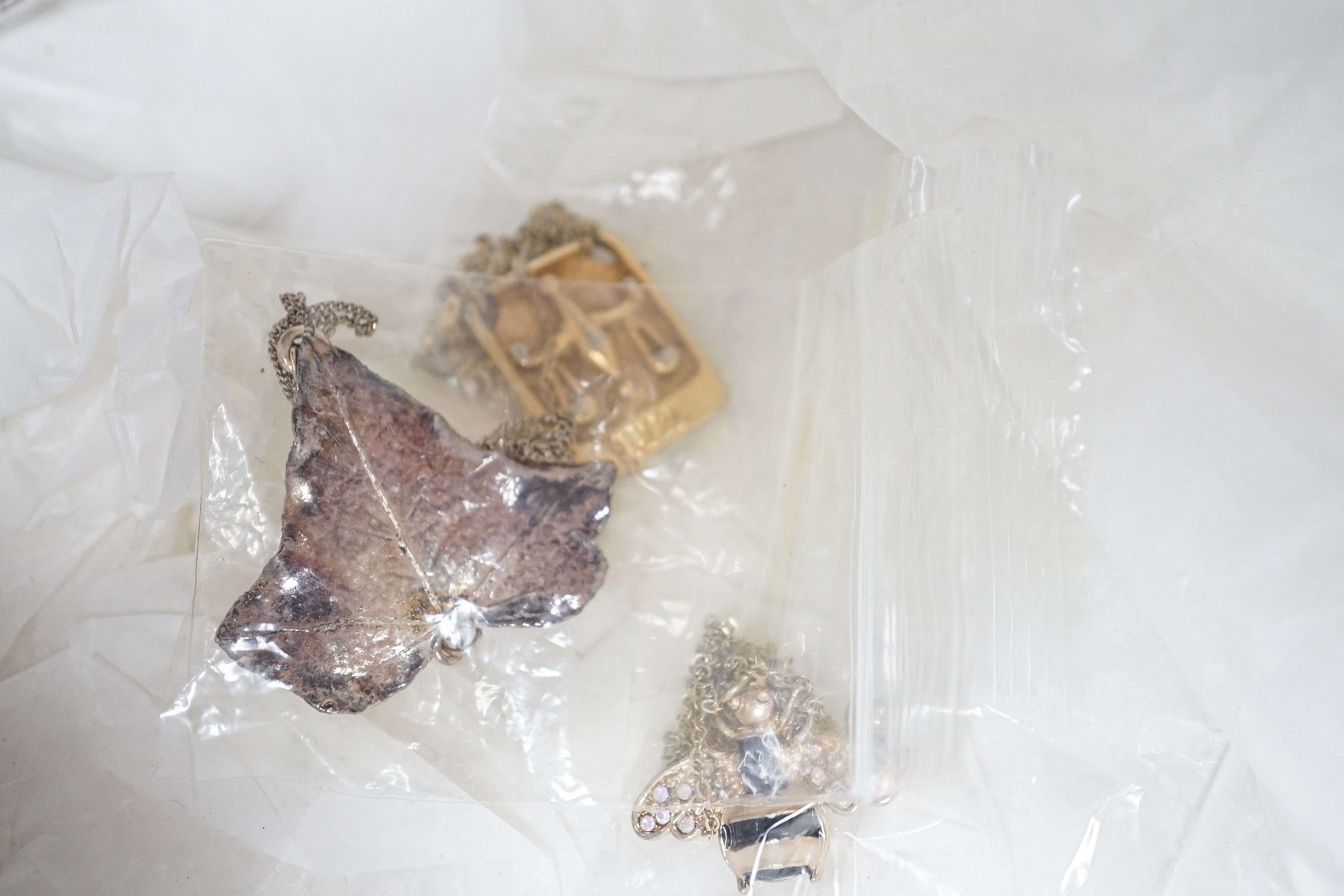 A box of mixed costume jewellery.